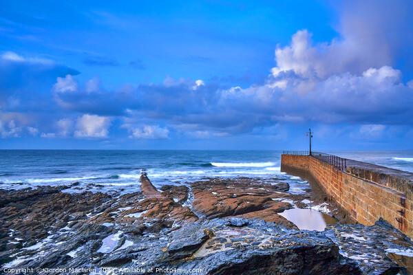 Sunrise over Porthleven Beach and jetty, Cornwall Picture Board by Gordon Maclaren