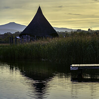 Buy canvas prints of Sunset over the Crannog, Llangorse Lake by Gordon Maclaren