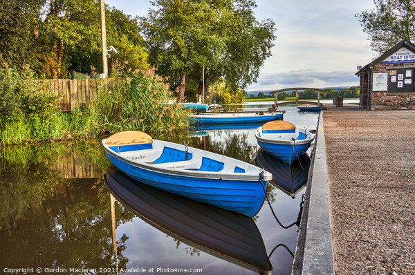 Boats moored in Llangorse Lake Brecon Beacons Picture Board by Gordon Maclaren