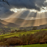 Buy canvas prints of God's rays over the Brecon Beacons, South Wales by Gordon Maclaren