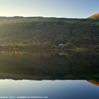 Buy canvas prints of Sunset reflections in Tal-y-llyn Lake by Gordon Maclaren