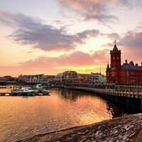 Buy canvas prints of Sunset over Cardiff Bay and the Pierhead Building by Gordon Maclaren