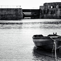 Buy canvas prints of Boat moored in Mousehole Harbour Cornwall by Gordon Maclaren