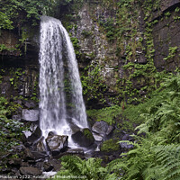 Buy canvas prints of A large waterfall in a forest by Gordon Maclaren