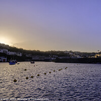 Buy canvas prints of Winter Sunset over Mevagissey Harbour, Cornwall by Gordon Maclaren
