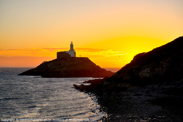 Sunrise Mumbles Lighthouse Picture Board by Gordon Maclaren