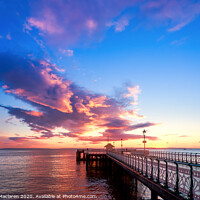 Buy canvas prints of Winter Sunrise over the Victorian Penarth Pier by Gordon Maclaren