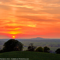 Buy canvas prints of Sunset over Glastonbury from Glastonbury Tor by Gordon Maclaren
