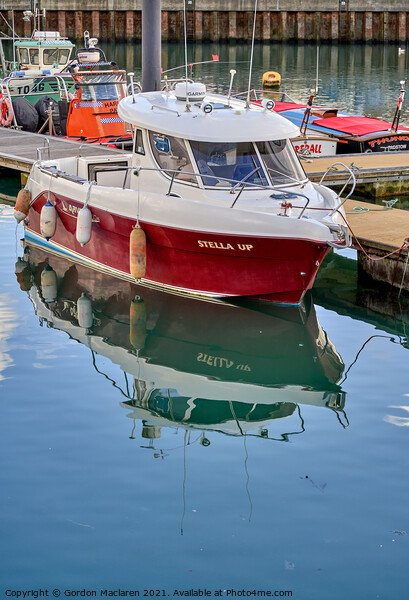 Boat moored in Padstow Harbour Picture Board by Gordon Maclaren