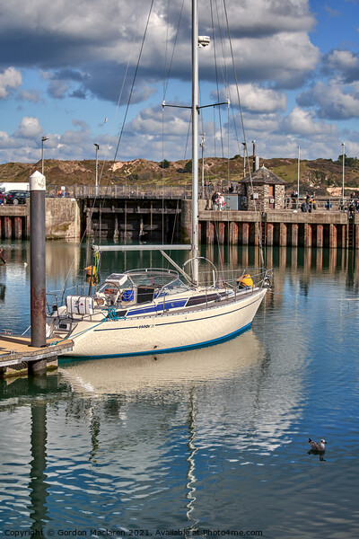A yacht moored in Padstow Harbour, Cornwall. Picture Board by Gordon Maclaren