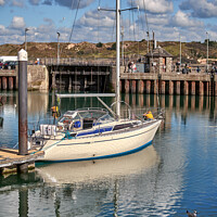 Buy canvas prints of A yacht moored in Padstow Harbour, Cornwall. by Gordon Maclaren