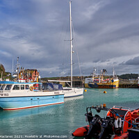 Buy canvas prints of Boats moored in Padstow Harbour Cornwall by Gordon Maclaren