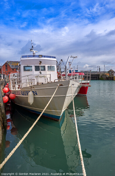 Fishing Boat docked in Padstow Harbour, Cornwall Picture Board by Gordon Maclaren