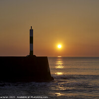 Buy canvas prints of Sunset over Aberystwyth Breakwater and lighthouse by Gordon Maclaren