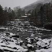 Buy canvas prints of Snowy Falls of Dochart  by Emma Dickson