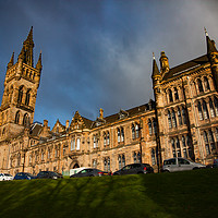 Buy canvas prints of Glasgow University in evening light on blue sky. by Alexey Rezvykh