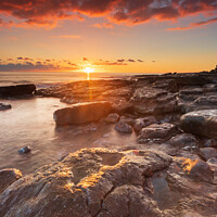 Buy canvas prints of Sunset at Ogmore by sea in South Wales UK by Richard O'Donoghue