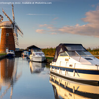 Buy canvas prints of Boats moored at Horsey Mill on the Norfolk Broads at sunrise by Richard O'Donoghue