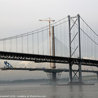 Buy canvas prints of The Forth Road Bridge and the Queensferry Crossing unde construction by Adrian Snowball
