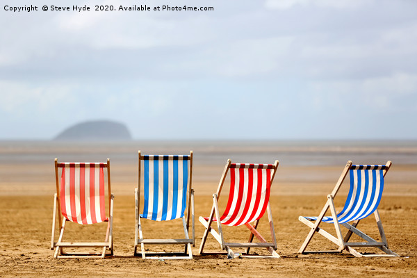 Colourful wooden deck chairs on a beach Picture Board by Steve Hyde