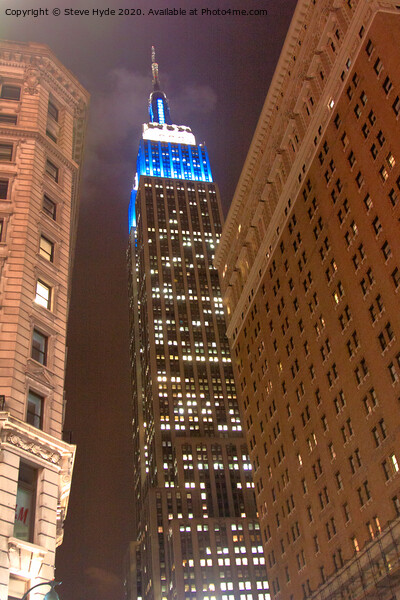 The Empire State Building, New York City illuminated at night Picture Board by Steve Hyde