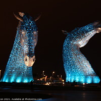 Buy canvas prints of The Kelpies in blue. by Paul Clifton