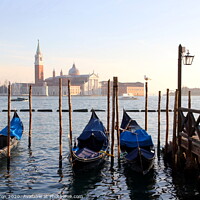 Buy canvas prints of Gondolas and San Maggiore by Paul Clifton