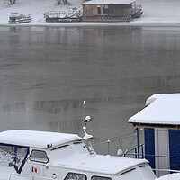 Buy canvas prints of Boats under the snow on the river Borcea by liviu iordache