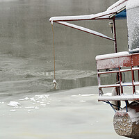 Buy canvas prints of Pontoon frozen on the river Borcea by liviu iordache
