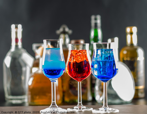 Colorful drink on the background of bottles in ori Picture Board by Q77 photo