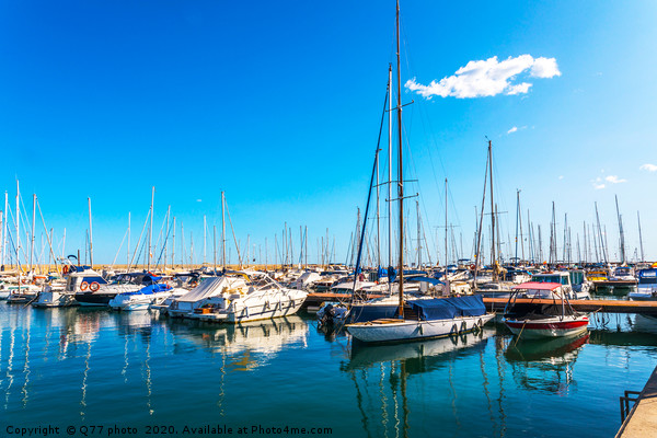 Beautiful luxury yachts and motor boats anchored i Picture Board by Q77 photo