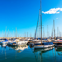 Buy canvas prints of Beautiful luxury yachts and motor boats anchored i by Q77 photo