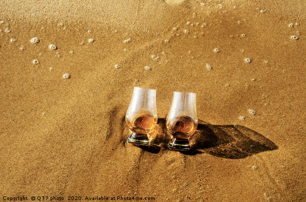 a glass of whiskey single malt on the sand washed  Picture Board by Q77 photo