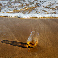 Buy canvas prints of a glass of whiskey single malt on the sand washed by the waves, a glass of tasting, relax on the beach by Q77 photo