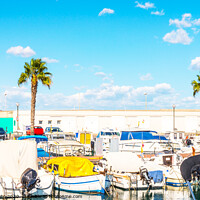 Buy canvas prints of Beautiful luxury yachts and motor boats anchored in the harbor, hot summer day and blue water in the marina, blue sky by Q77 photo