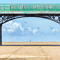 Buy canvas prints of Walking Under Pier by Rick Lindley