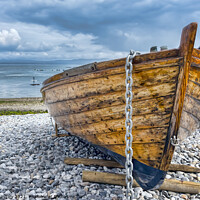 Buy canvas prints of The Wooden Boat by Rick Lindley