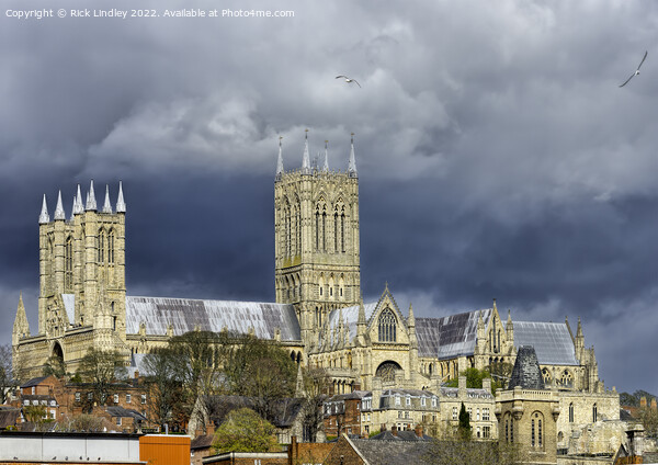 Storm Clouds over Lincoln Cathedral Picture Board by Rick Lindley