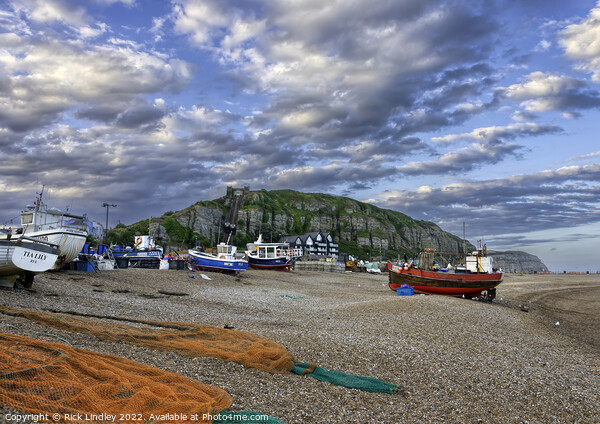 Fishing Boats On Hastings Beach With Evening Sky Picture Board by Rick Lindley