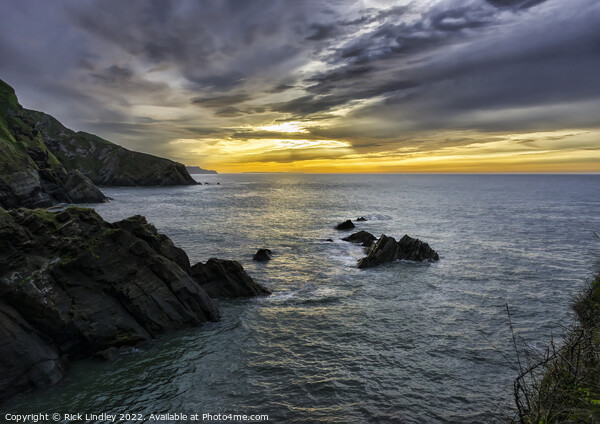 Sunset Over Lundy Island Picture Board by Rick Lindley