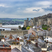 Buy canvas prints of Conwy Castle Over The Rooftops by Rick Lindley