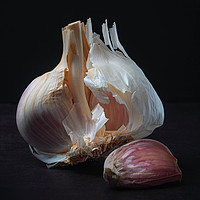 Buy canvas prints of Majestic Garlic on Dark Background Still Life by Ioan Decean