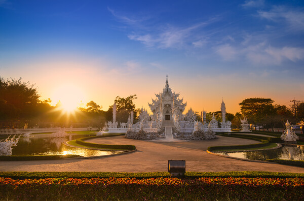 Wat Rong Khun in Chiang Rai at sunset Picture Board by Anahita Daklani-Zhelev
