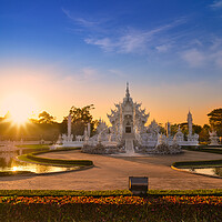 Buy canvas prints of Wat Rong Khun in Chiang Rai at sunset by Anahita Daklani-Zhelev