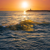 Buy canvas prints of Sunrise over sea waves by Jordan Jelev