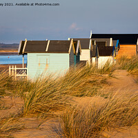 Buy canvas prints of Evening Light on the Beach Huts at Wells  by David Powley