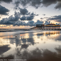 Buy canvas prints of Relections on Cromer Beach Norfolk by David Powley