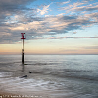 Buy canvas prints of Evening light on the beach at Caister-on-Sea by David Powley