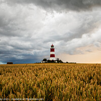 Buy canvas prints of Moody Sky Over Happisburgh Lighthouse by David Powley