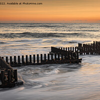 Buy canvas prints of Sunrise Glow on Caister Beach by David Powley